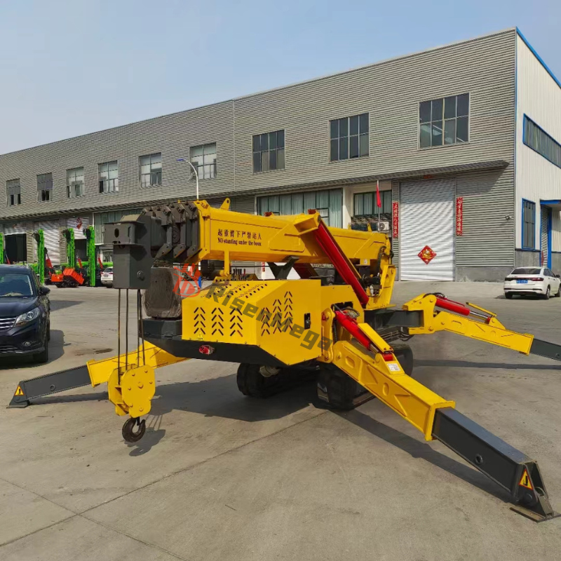 Risenmega 2-ton mini spider crane showing rubber crawler tracks and hydraulic outriggers