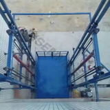 Risenmega heavy-duty electric guide rail cargo lift for 3 to 15 meter warehouse freight transport